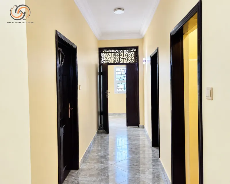 Bright corridor with timber doors