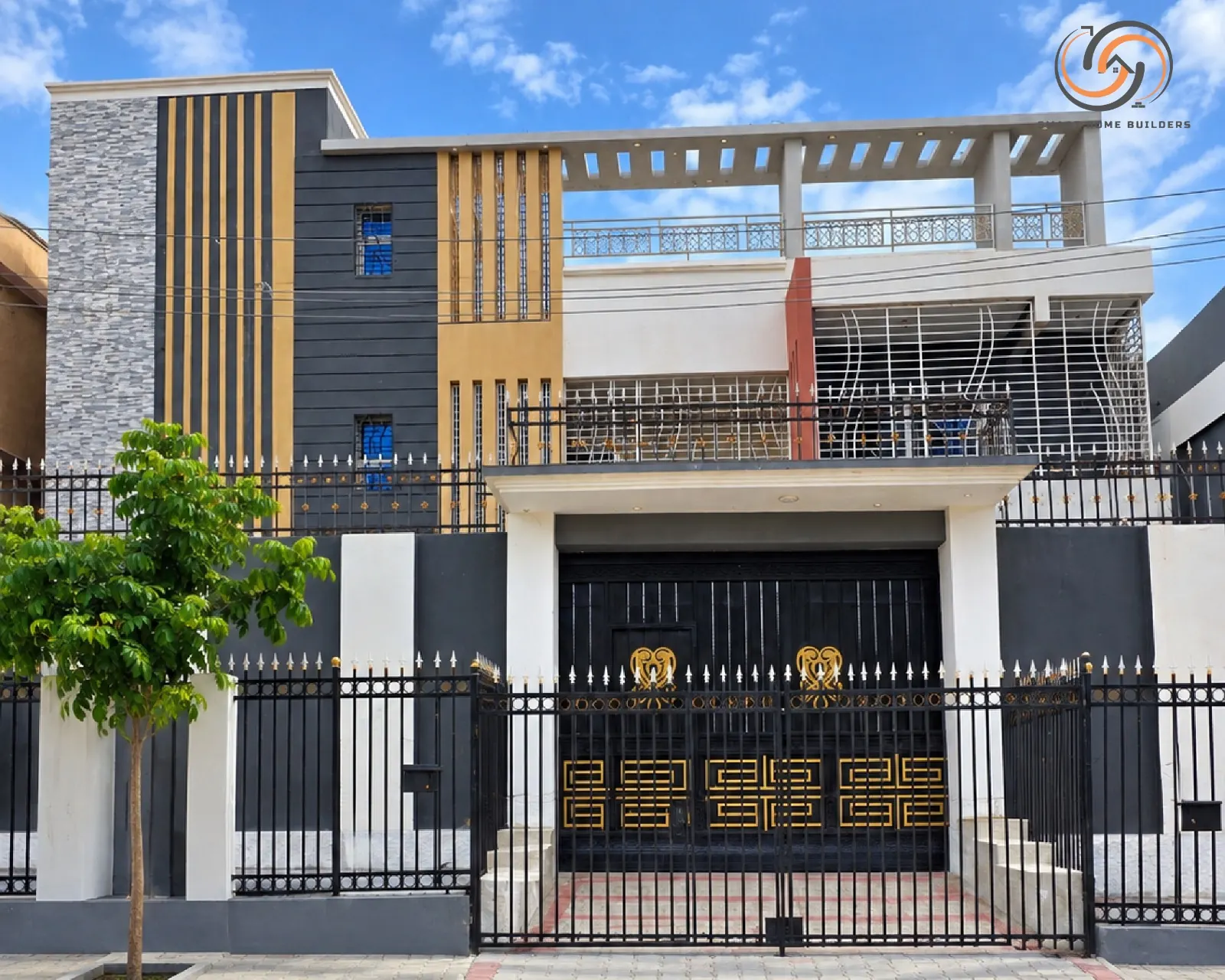 A Smart Home Builders two-storey villa with a decorative steel gate